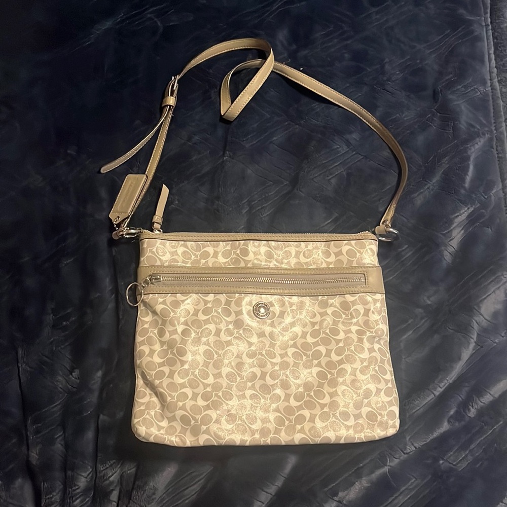 Coach purse….gray and white with purple interior and silver hardware.